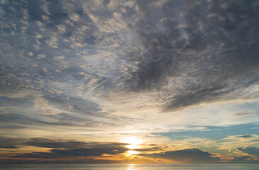 Wall Mural - abstract amazing scene of stuning colorful sunset with clouds background in nature and travel concep