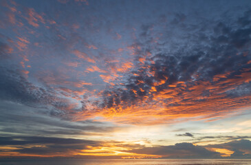 Wall Mural - abstract amazing scene of stuning colorful sunset with clouds background in nature and travel concep