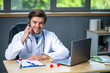 © All king of people - profesional doctor working at his desk collecting data