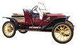 A red steam-powered vintage sports car from the early twentieth century. This old automobile has polished brass lamps and trim and yellow painted wheels.