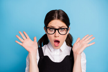 Poster - Close-up portrait of her she nice attractive lovely pretty worried brunette schoolgirl nerd geek panic bad news fail test exam mark isolated over bright vivid shine vibrant blue color background