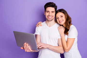 Sticker - Photo pretty lady handsome guy couple good mood hold notebook hands watch movie film together spend free time leisure wear casual white t-shirts isolated purple pastel color background