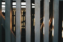 Close-up Of Wooden Fence In Sunset