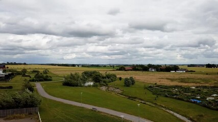 Wall Mural - Timelapse of rural landscape and clouds outside the town of Lund, Sweden