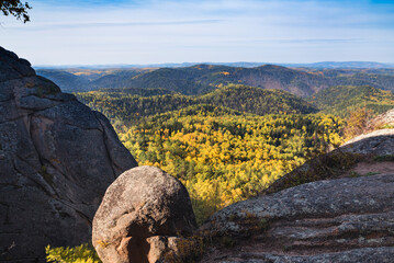 Autumn mountain forest, rocks. Mountain rocks in autumn forest. Autumn landscape