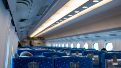 Rows of empty seats on a commuter train in Japan due to COVID travel restrictions