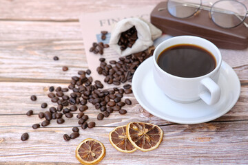 Canvas Print - top view coffee cup and coffee beans on wood table, space for text