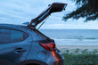 © Jarukit - Open the hatchback door with a sea view. Travel, Lifestyle