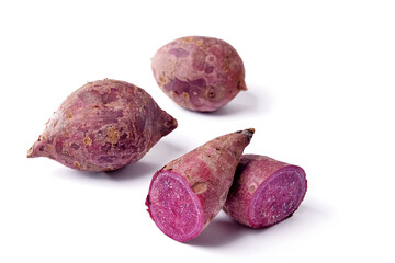 Three Purple Sweet Potato On The White Background