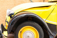 Close-up Detail Of A Black Yellow Vintage Citroen 2cv Car