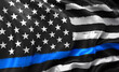 © mozZz - Black lives matter flag, with a blue line, blowing in the wind. Full page striped black and white USA flying flag.