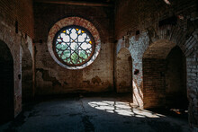Round Stained Glass Window In Old Abandoned Castle