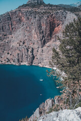 Wall Mural - Oludeniz Butterfly Valley, stunning beautiful scenery, blue sea of pine and high cliffs, travel to Turkey