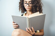 © ARAMYAN - glasses woman reading book