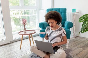 Wall Mural - Woman telecommuting during Covid-19 outbreak