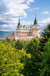 © lubos K - View of neogothic Bojnice castle over treetops of Castle park (Bojnice, Slovakia)