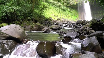 Wall Mural - La Fortuna Waterfall in the rainforest near Arenal Volcano in Costa Rica, Central America. Beautiful nature landscape at toursit travel destination landmark.