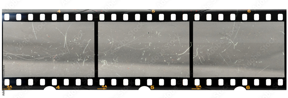 original 35mm filmstrip with empty dusty frames or cells and nice texture on the border, fluffs on film material, real film grain. - obrazy, fototapety, plakaty 