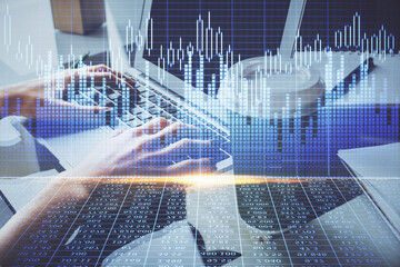 Double exposure of woman hands typing on computer and forex chart hologram drawing. Stock market invest concept.