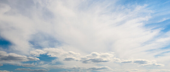 Wall Mural - Beautiful white clouds against the background of the sky