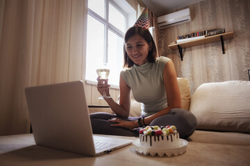 Girl celebrating birthday online in quarantine time.