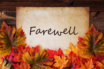 Wall Mural - grungy old paper with english text farewell. colorful autum decoration with leaves
