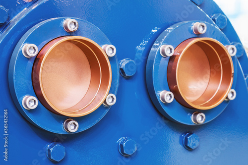 Fotomural thick copper pipes with flanges for cooling or air conditioning systems