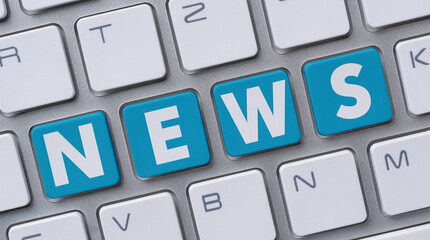 Wall Mural - a computer keyboard with the word news