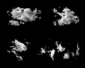 Poster - Four white natural clouds isolated on a black background.