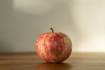 red apple on table