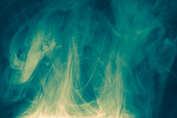 Wall Mural - clouds of colored flowing smoke on a dark background.
