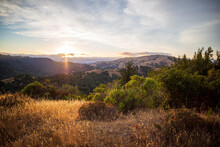Sun Set Over Distant Fog Bank Casts Golden Glow Over Beautiful Landscape In The Marin Headlands