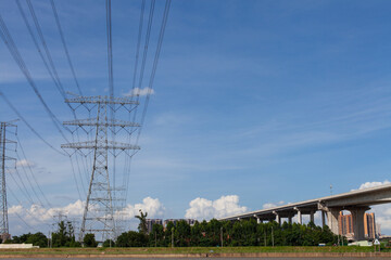 High voltage wire rack under blue sky, Energy concept.