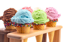 Six Flavors Of Ice Cream Flavors In Sugar Cones With Sprinkles