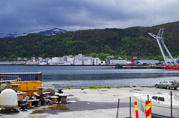 Breathtaking mountain range scenery and landscape with fjord around city of Alesund in Norway. A popular tourist and cruise ship destination in Scandinavia with Art Nouveau architecture and beauty