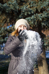 Wall Mural - Beautiful young blonde girl in winter.