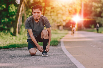 Wall Mural - Man start running on road (concept run,sport,active,lifestyle,exercise,fitness)