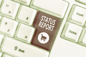 Poster - Text sign showing Status Report. Business photo showcasing summarizes the particular situation as of a stated period Different colored keyboard key with accessories arranged on empty copy space