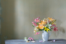 Beautiful Lily In White Jug On Wooden Table