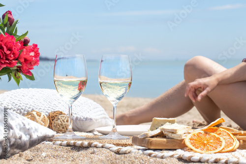 A girl is resting on the beach Poster Mural XXL