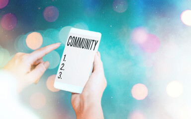 Poster - conceptual hand writing showing community. concept meaning group of showing living in one place havi