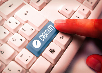 Poster - Conceptual hand writing showing Creativity. Concept meaning the imagination of original ideas in particular in the creation of art White pc keyboard with empty note paper above white key copy space