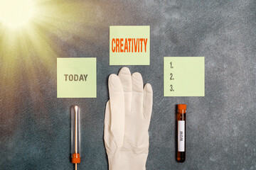 Poster - Word writing text Creativity. Business photo showcasing the imagination of original ideas in particular in the creation of art Extracted blood sample vial with medical accessories ready for