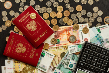 Wall Mural - inscription passport russian money coins and paper rubles lying on the table