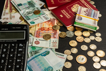 inscription passport russian money coins and paper rubles lying on the table