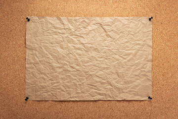 Wall Mural - sheet of paper pinned at corkboard as background