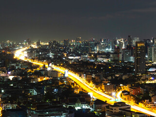 Bangkok cityscape night view in the business district, skyscraper modern building, hotel and resident area with night light in capital city