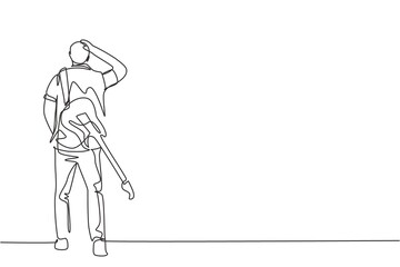Canvas Print - One continuous line drawing of young happy male rock guitarist walking while carrying electric guitar on his shoulder. Musician artist concept single line draw design graphic vector illustration