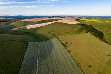 Canvas Print - Stunning drone landscape image of English countryside during late afternoon sunset Summer light