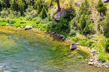 Flaming Gorge National Recreational Area in Utah Park near Dam high angle aerial view of green river in summer by Little Hole Trail near Spillway Boat Launch